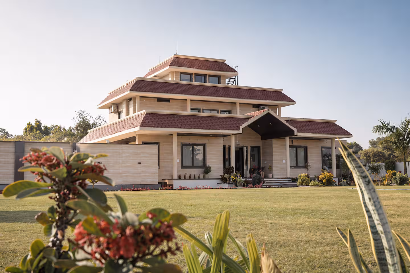 Zeke Farm at golden hour, the Aravallis behind
